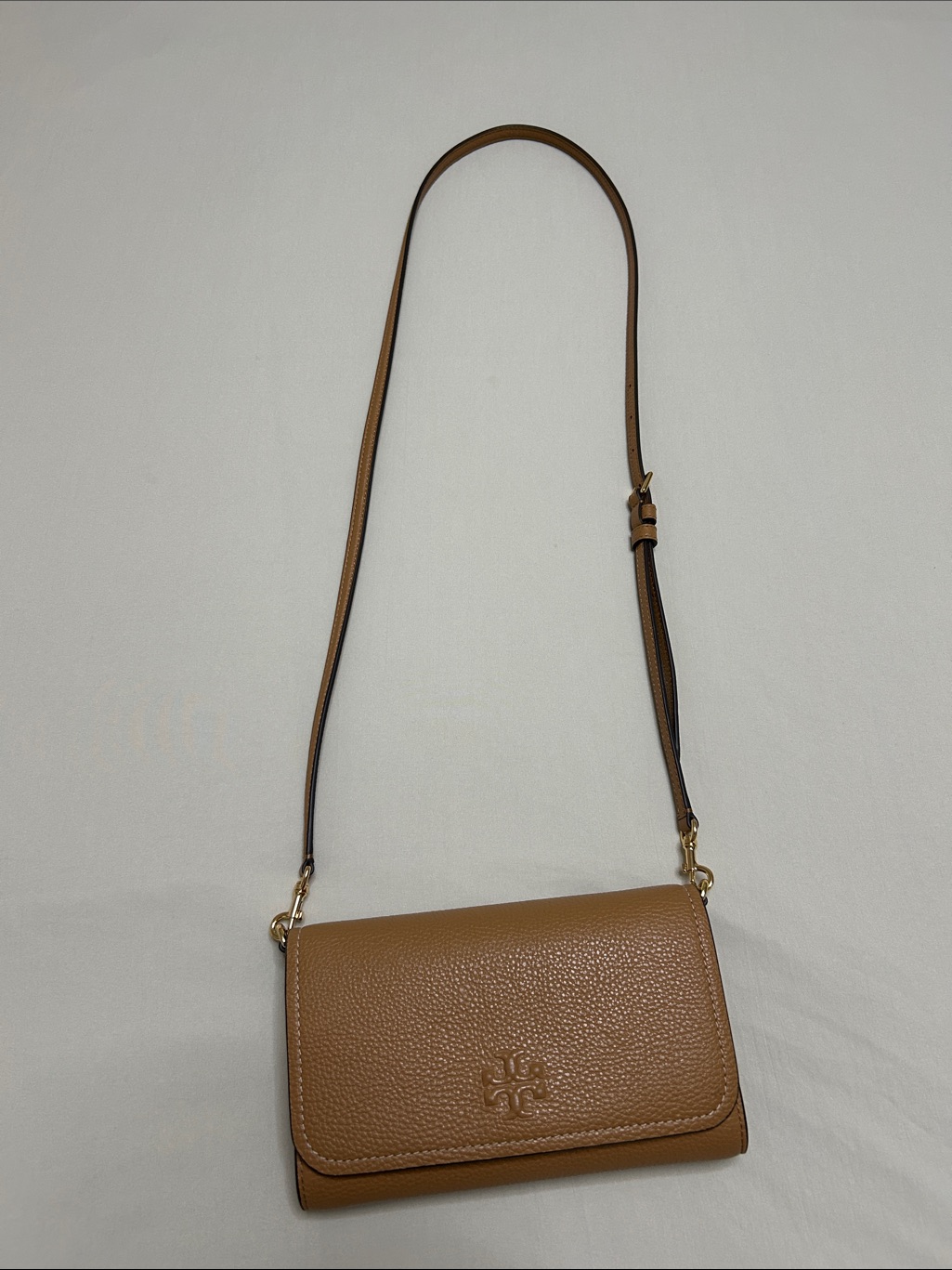 Tory Burch Chestnut Pebbled Leather Crossbody With Gold Hardware.